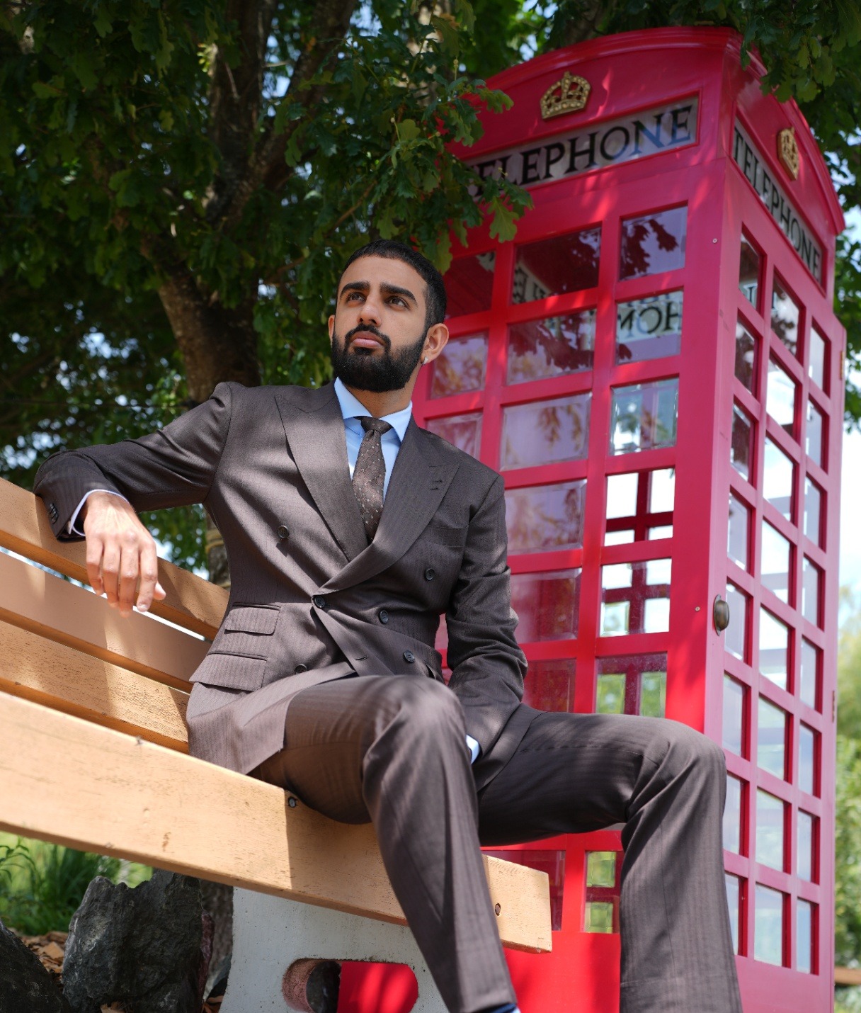 Bespoke double-breasted suit captured on a Fraser Valley bench by Suited Booted & Co.