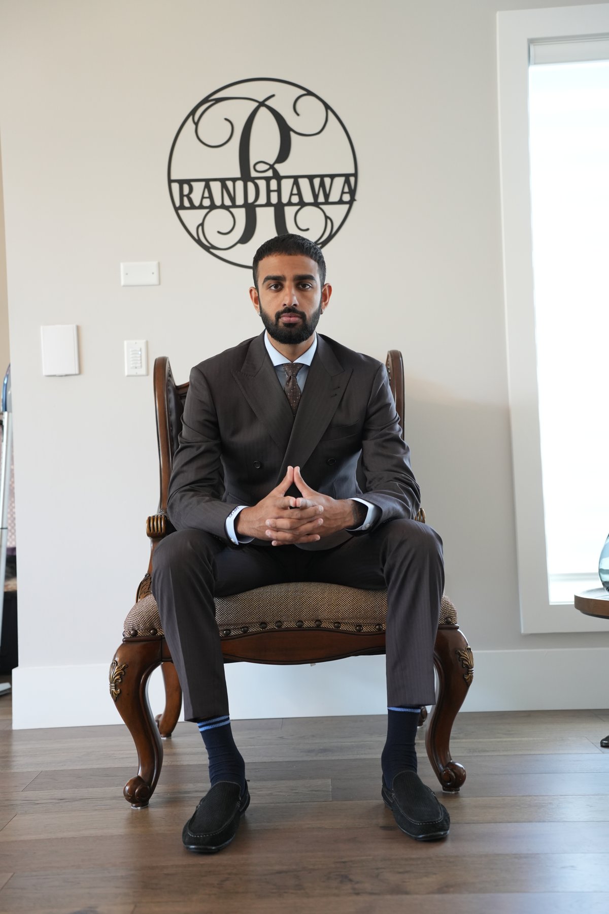 Three-piece brown bespoke suit on the Randhawa estate by Suited Booted & Co.